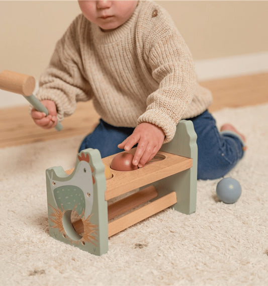 Hitting bench with Little Farm ball