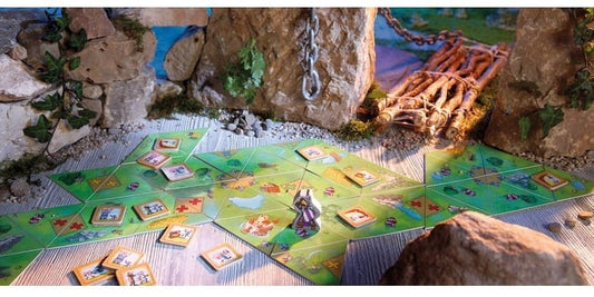 Tablero de juego con piezas y personaje central mostrando cómo jugar Valerio el valiente paso a paso