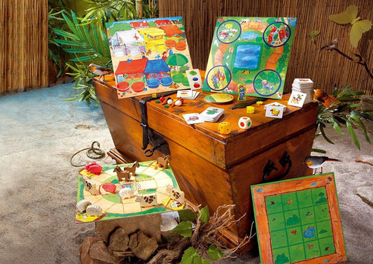 Juego de mesa familiar con tableros y piezas para aprender cómo jugar al parchís de la granja