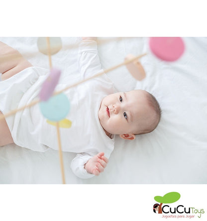 Colorful wooden mobile in pastel tones