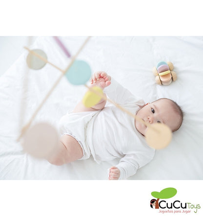 Colorful wooden mobile in pastel tones