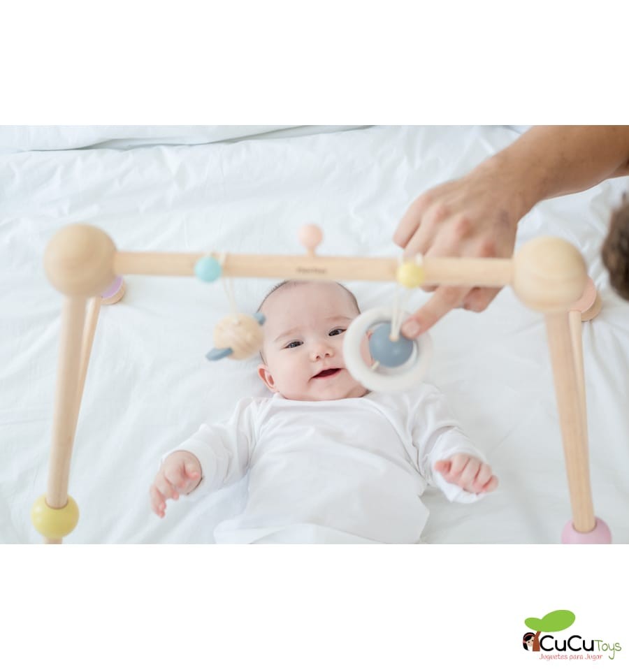 Baby gym in pastel tones