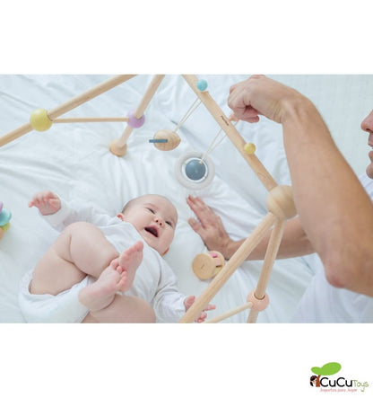 Baby gym in pastel tones