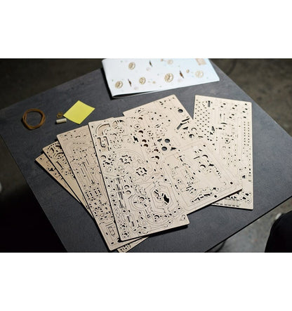 Corrida de bolinhas de gude em cadeia