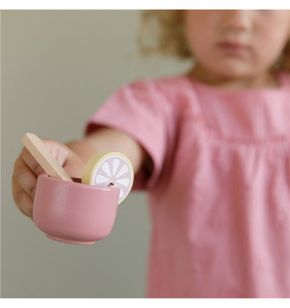 Wooden tea set in pastel colors
