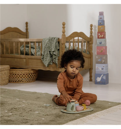 Wooden tea set in pastel colors