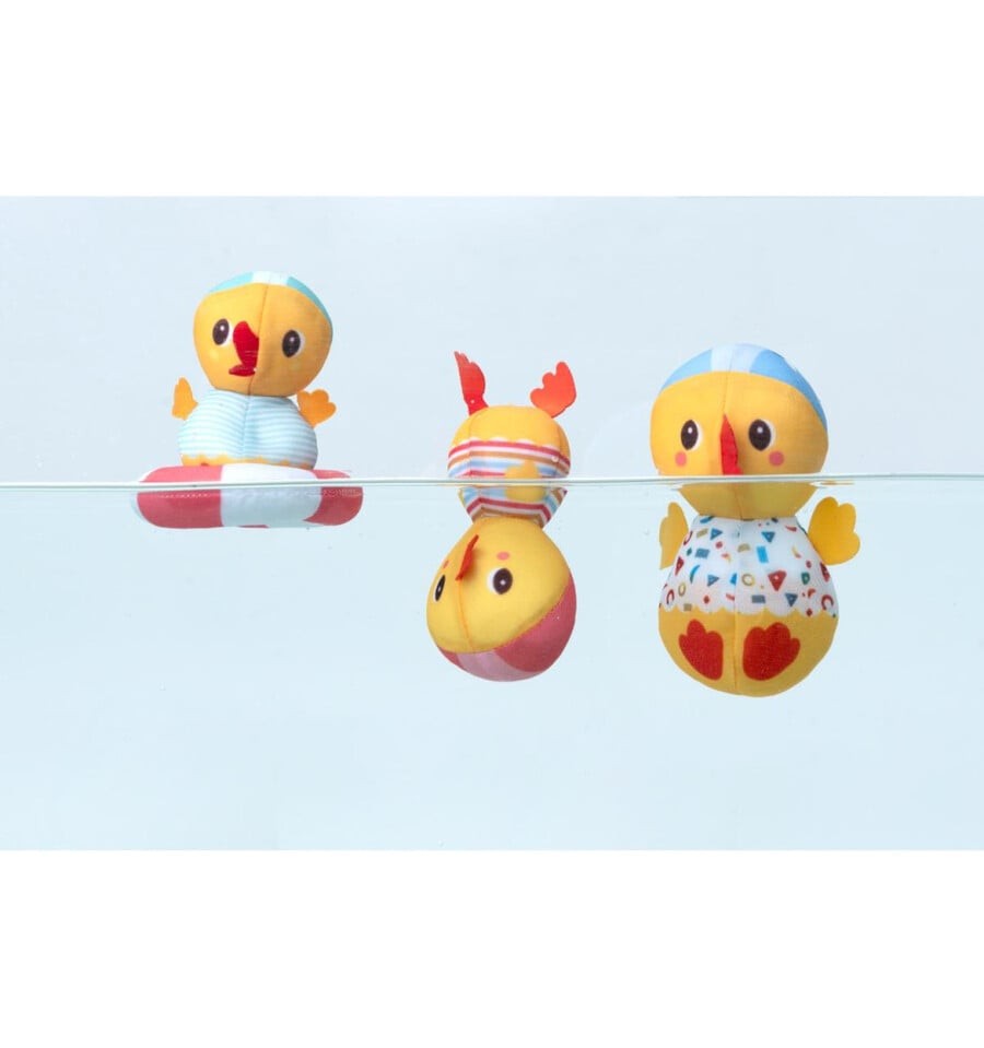 3 ducks by the water