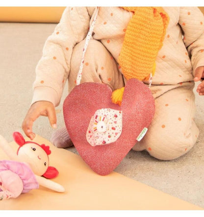 Aline doll with heart-shaped bag