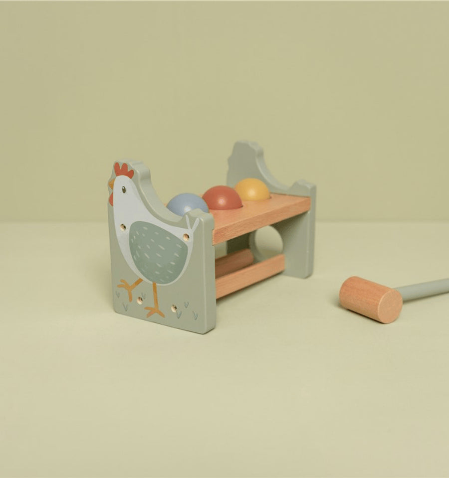 Hitting bench with Little Farm ball