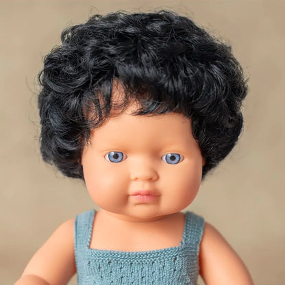 Brunette Caucasian doll with curls