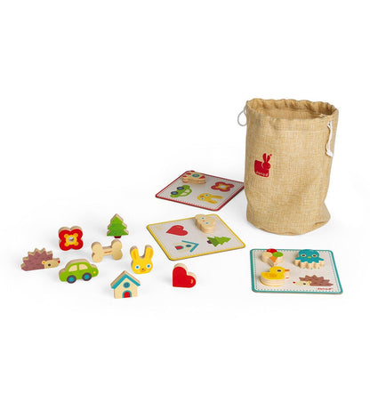 Memo sonoro de madera Janod con piezas de colores y bolsa de almacenamiento beige