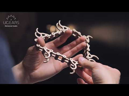 Corrida de bolinhas de gude em cadeia